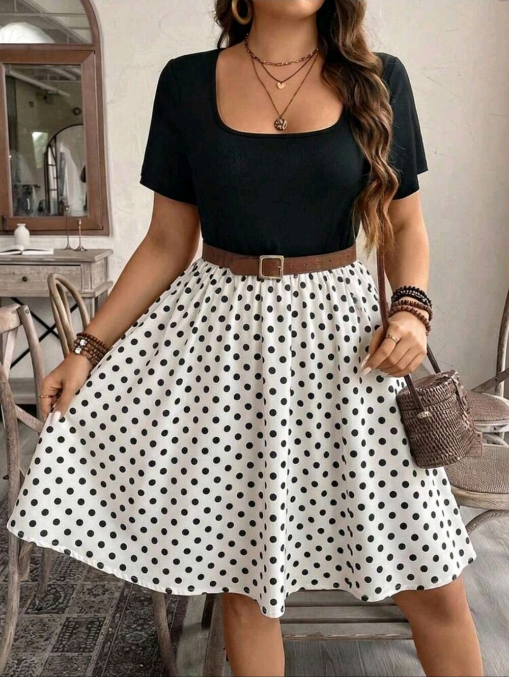 Black Scoop Neck Skater Dress with White Polka Dot Skirt.